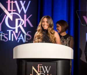 Associate producer Susan Ansman addresses the NY Festival Awards audience as she accepts a variety of winning entries for the Features Units, including two Gold Medals. (Courtesy New York Festivals)