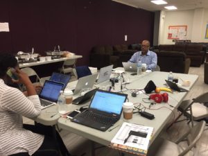 Senior Vice President and Editor-in-Chief of The Undefeated, Kevin Merida, works from the site of the Chicago public forum, the South Side YMCA. (Sharon Matthews/ESPN)