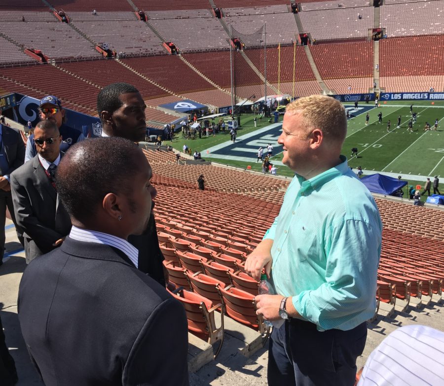 Sunday NFL Countdow producer Matthew Garrett (right) consults with new analysts Randy Moss and Charles Woodson (foreground). (Photo courtesy of Matthew Garrett/ESPN)