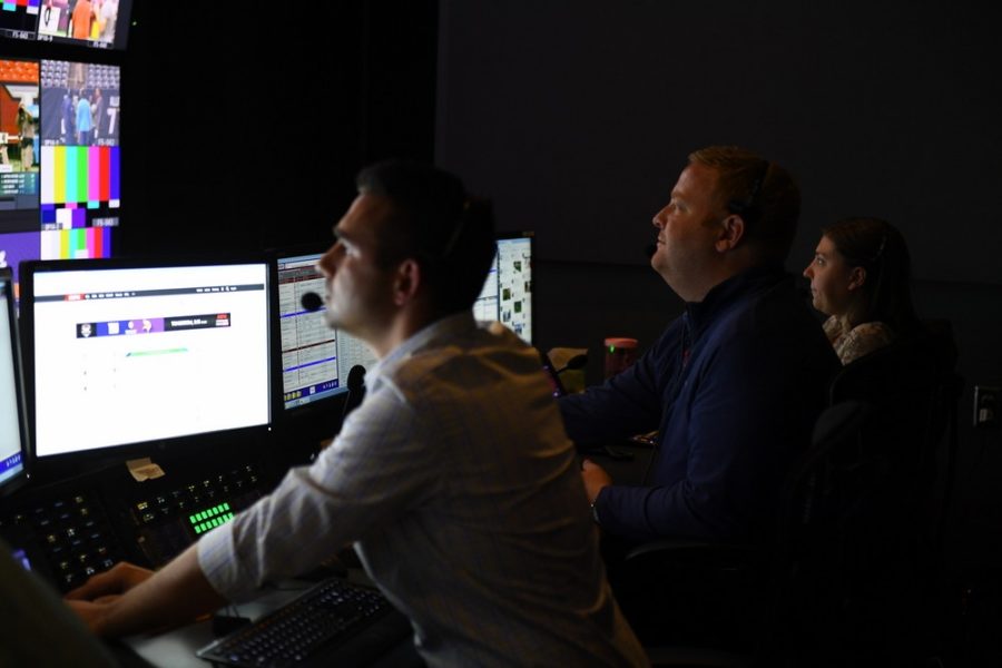 Sunday NFL Countdownâ€™s duo of producers Matthew Garrett (middle) and Chad Minutillo (left) run the program from the control room. (Joe Faraoni/ESPN Images)
