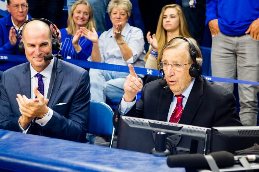 ESPN analyst Jay Bilas (L) joins the Rupp Arena crowd applauding Brent Musburger during Musburger's last ESPN play-by-play call on Jan. 31 in Lexington, Ky. (Mat Gdowski/ESPN Images (Mat Gdowski/ESPN Images)