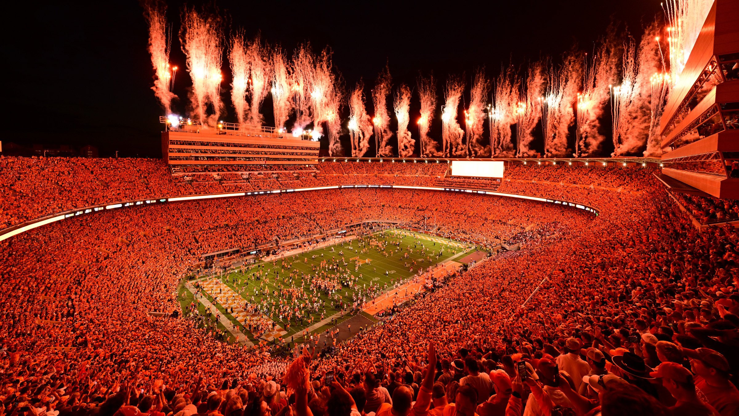 Knoxville, TN - October 15, 2022 - Neyland Stadium: Fans of the Tennessee Volunteers (Vols) storm the field following a regular season game.(Photo by Phil Ellsworth / ESPN Images)